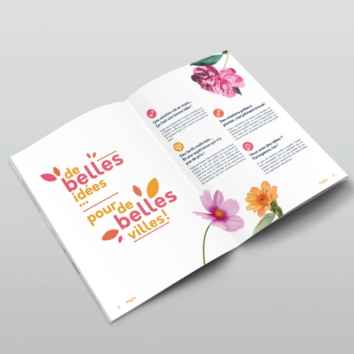 Création de brochure simple et élégant, efficace et moderne avec une touche féminine pour un fleuriste. Plaquette fleurie avec des couleurs du printemps. Réalisation par une graphiste freelance à Aurillac dans le Cantal. Studio de design et graphisme indépendant.