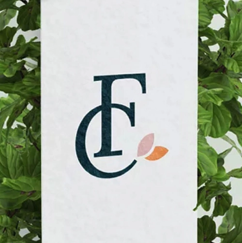 Création de logo monogramme simple et élégant, efficace et moderne avec une touche féminine pour un fleuriste. Charte graphique fleurie avec des couleurs du printemps. Réalisation par une graphiste freelance à Aurillac dans le Cantal. Studio de design et graphisme indépendant.